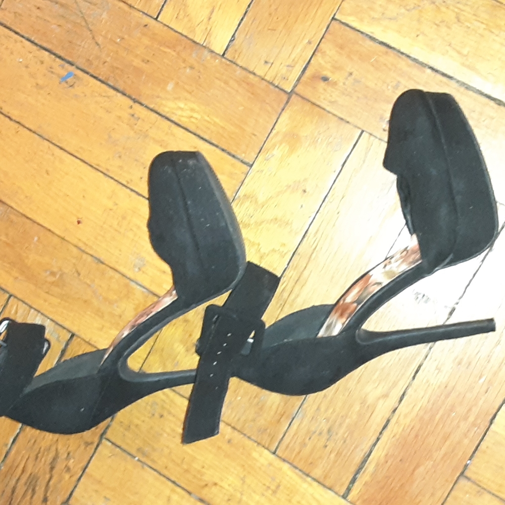 black platform 5in with 1.5 platform . ankle buckle